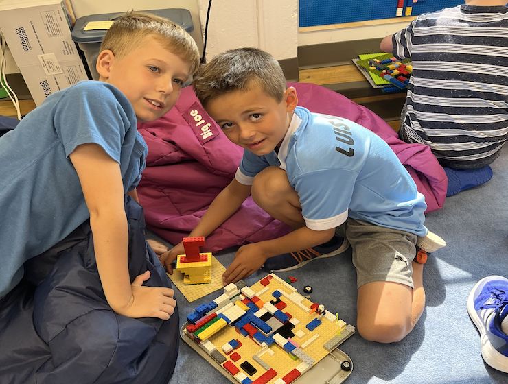 Campers playing with LEGOs